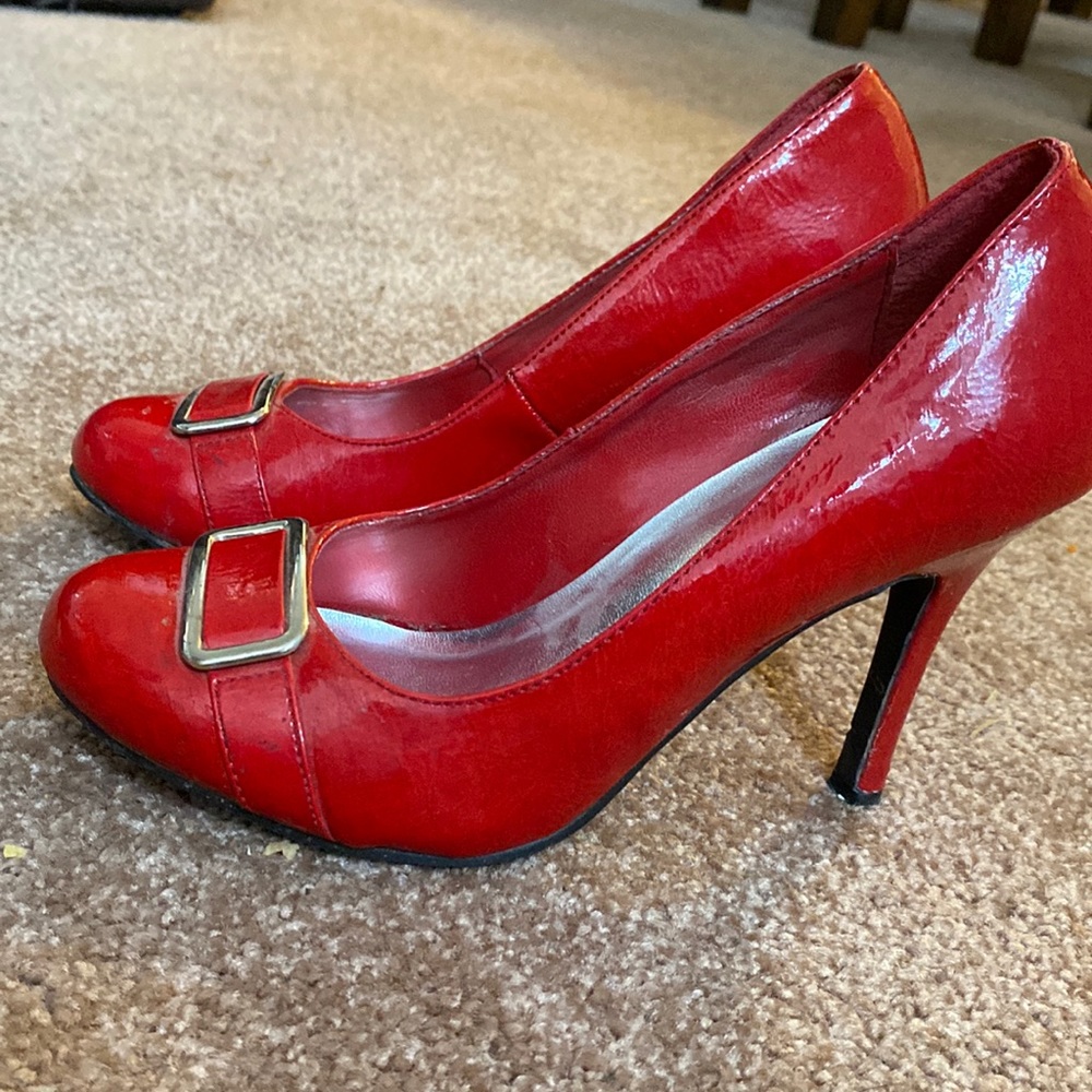 Red patent buckle heels by DELICIOUS